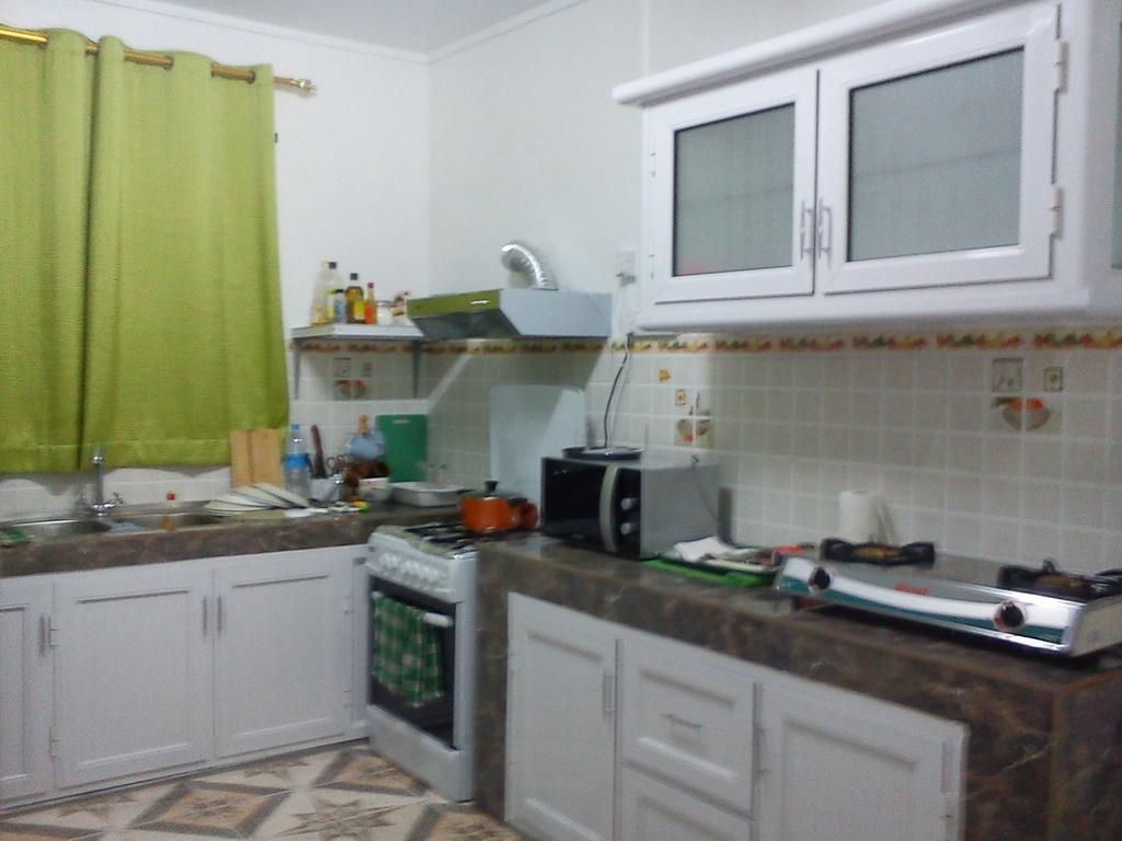 Chez Johnny - Blue Bay Hotel Bagian luar foto